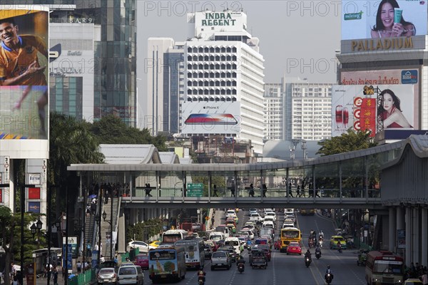 Busy road with pedestrian bridge