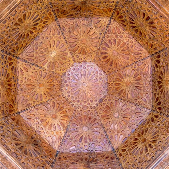 Carved wooden ceiling panels of Ben Youssef Madrasa