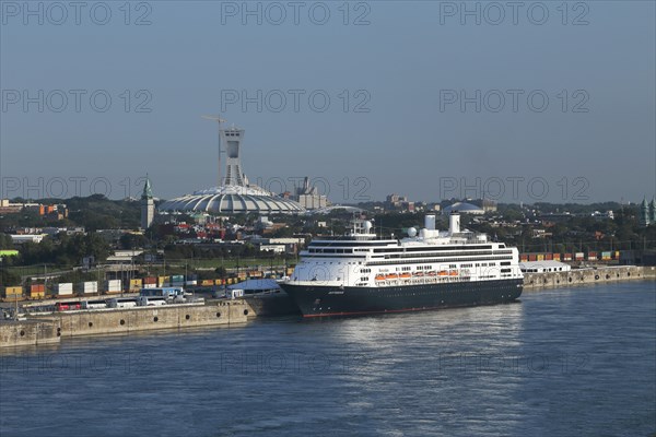 Cruise ship Rotterdam with Olympic Stadium behind