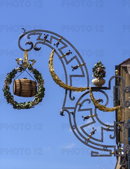 Hanging shop sign with a beer barrel