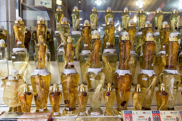 Ginseng in bottles at a market