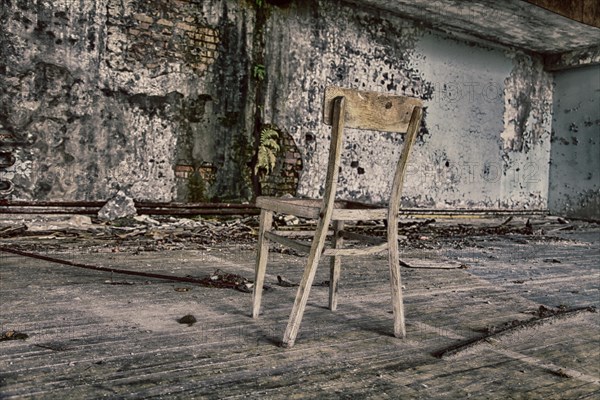 Chair in destroyed building