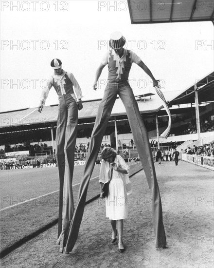 Men on stilts