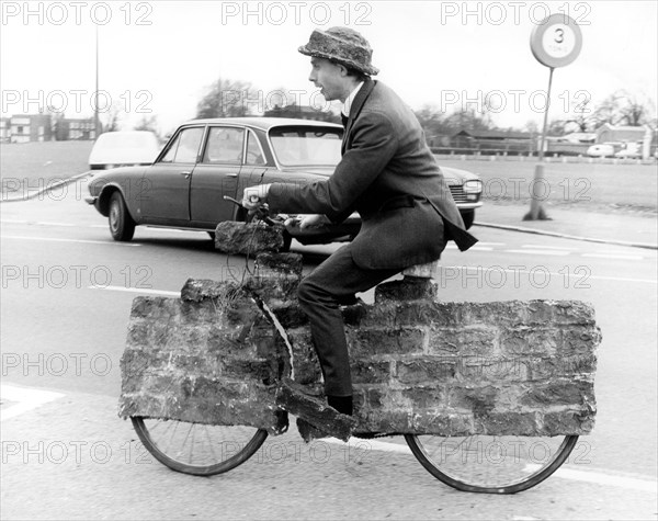 Man on a strange bicycle