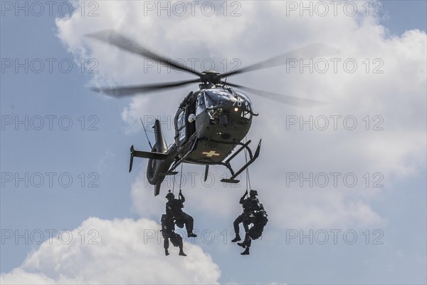 Special unit of police in exercise with helicopter