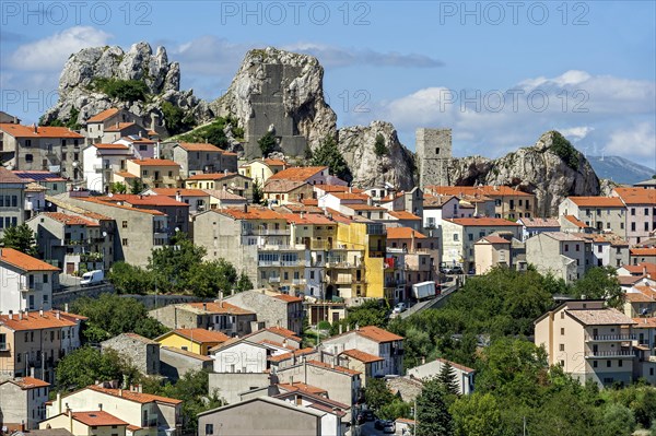 View of mountain village Pietrabbondante with church Chiesa di Santa Maria Assunta on rock Morg Caraceni