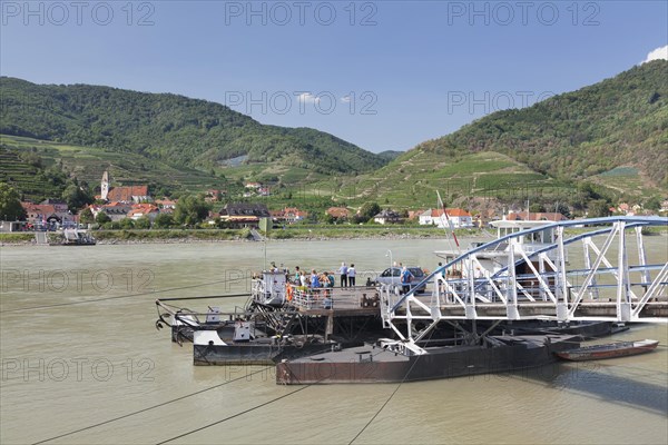 Ferry across the Danube to Spitz an der Donau with parish church St. Mauritius