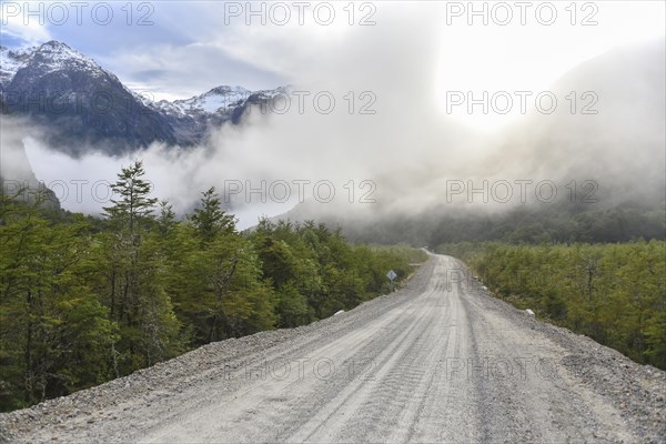 Gravel road with low clouds