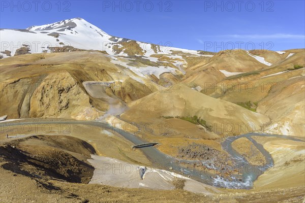 Mount Maenir rises above the hot spring area of Hveradalir
