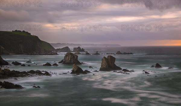 Sunset on the beach Playa del Silencio