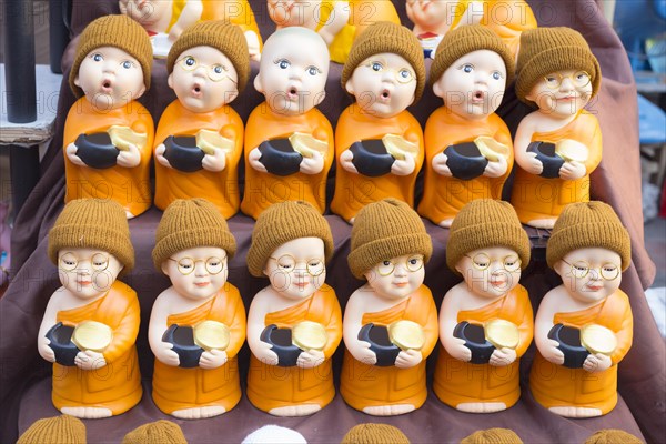 Monk toy puppets on display at the evening market