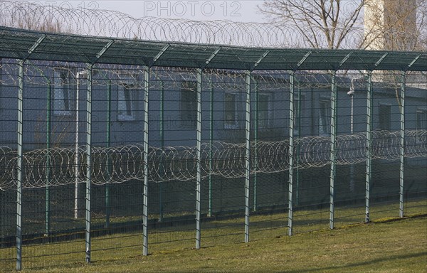 Barbed wire secured building