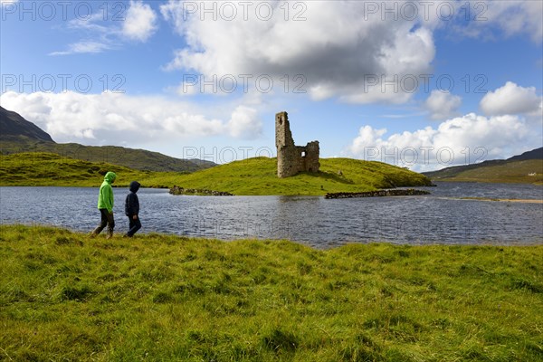 Walker at the ruins of the MacLeods of Assynt