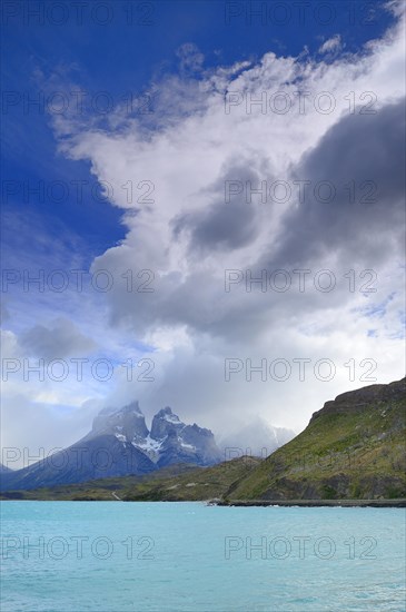 Cuernos del Paine massif with clouds on Lake Pehoe