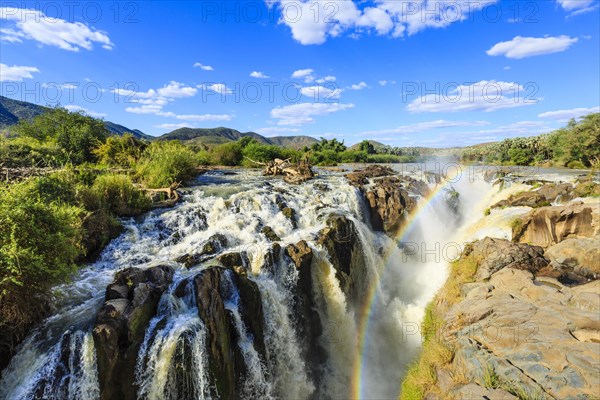 Rainbow over waterfall