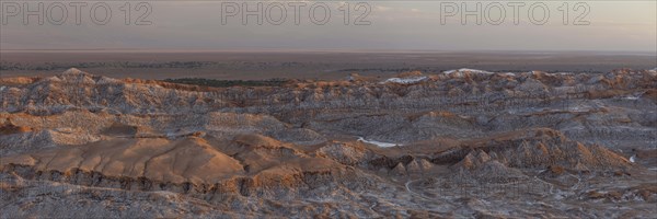 Bizarre red rock formations with white salt