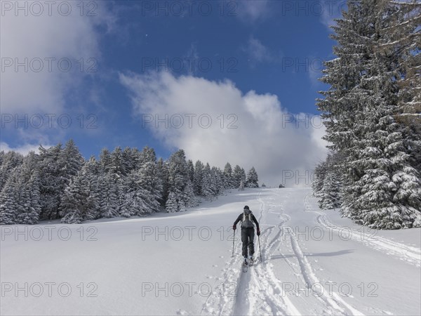 Ski mountaineer on the way to Unterberg