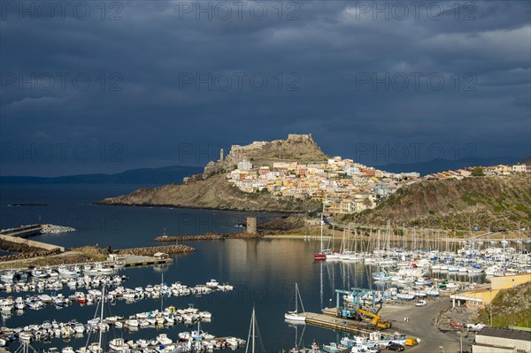 Dramatic light over the old town of Castelsardo with its boat harbour