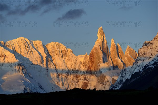 Cerro Torre with snow at sunrise