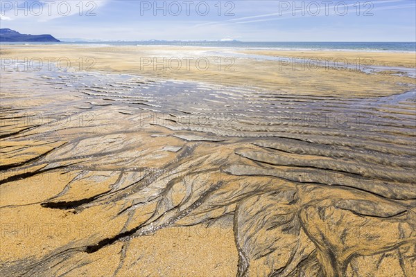 Sand structure with ripple at low tide