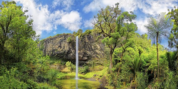 Wall of columnar basalt with waterfall Bridal Veil Falls