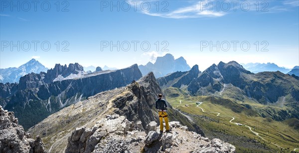 Hiker on the summit of the Averau