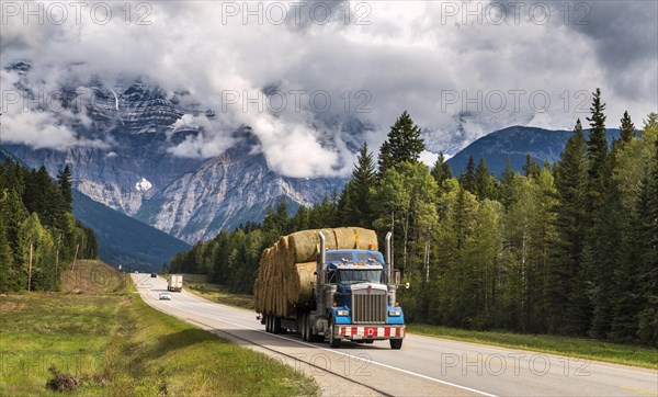 Truck loaded with straw bales on the Yellowhead Highway