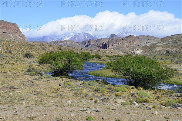 River with mountain panorama in the Meseta del Lago Buenos Aires