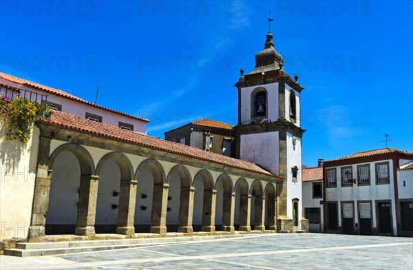 Arcade and clock tower on the central square of the Republic