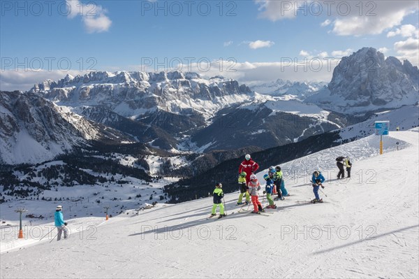 Children with ski instructor on the ski slope