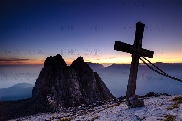 Summit cross of the third Watzmannkind in front of first and second Watzmannkind