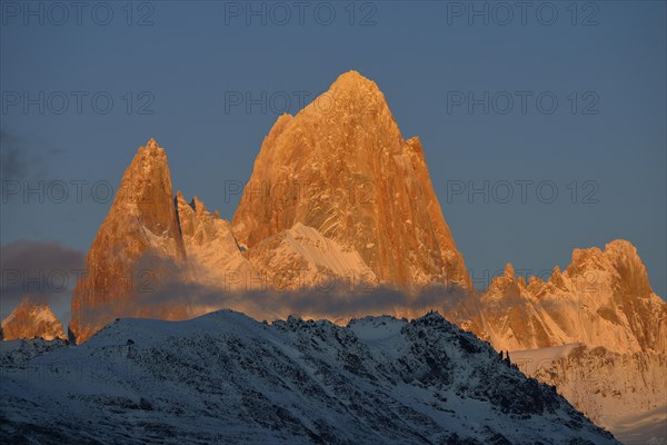 Snowy peak of Fitz Roy at sunrise