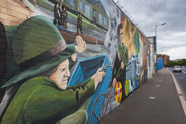 Political graffiti on wall in West Belfast reminiscent of the civil war between Protestants and Catholics