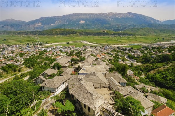 Cityscape with neighborhoods Old Bazaar and mountains