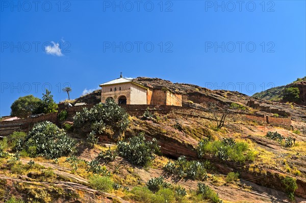 Semi-monolithic rock church Abreha wa Atsbeha on a rock hill near Wukro