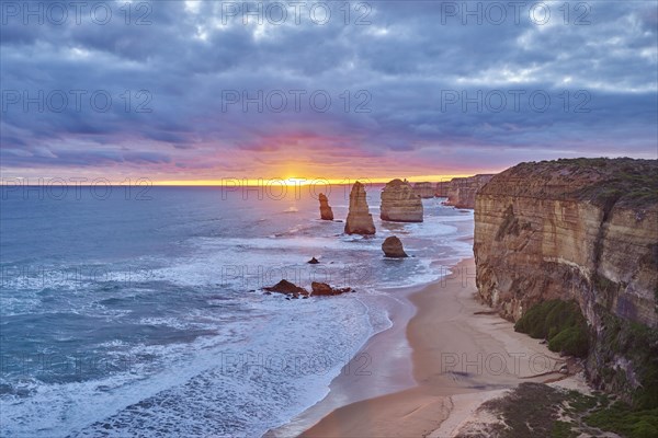 Rocky coast with the Twelve Apostles at sunset