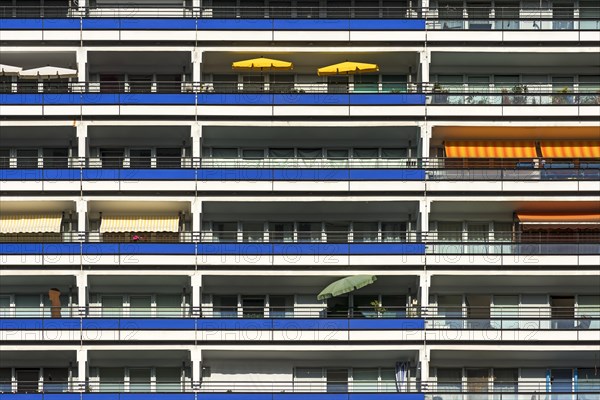 Detail of a high-rise facade with balconies on modernized prefabricated buildings