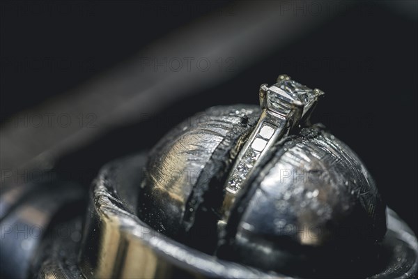 Precious diamond ring during repair and cleaning process
