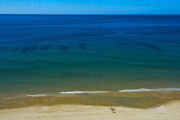 Empty sandy beach on the Algarve coast near Praia da Luz