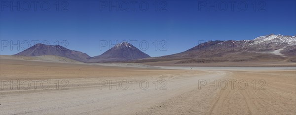 Runway on the Altiplano with volcano Licancabur