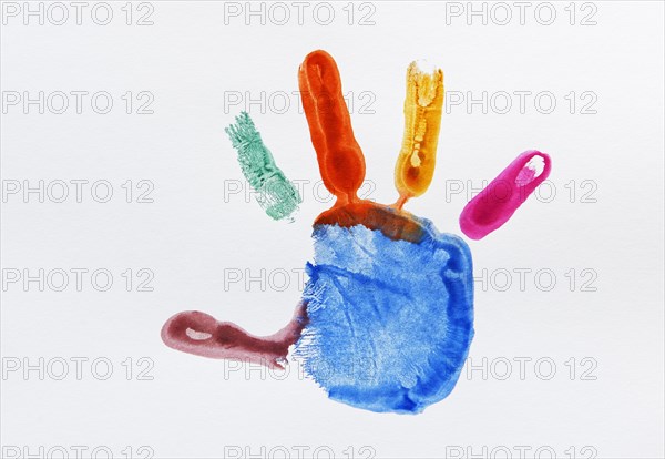Colourful impression of a painted child's hand
