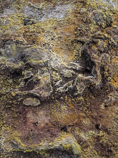 Volcanic rock with sulphur and mineral deposits