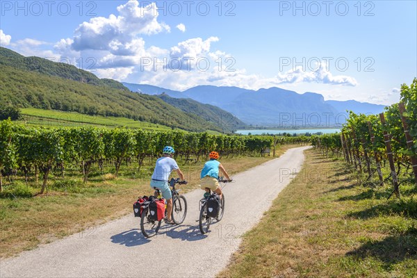 Two cyclists with mountain bike