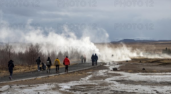 Tourists at the Haukadalur geothermal field