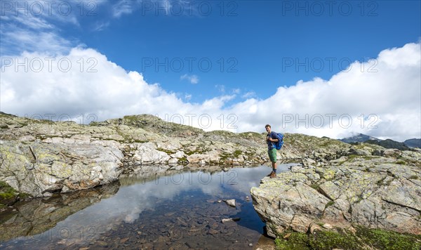 Hiker at a small lake