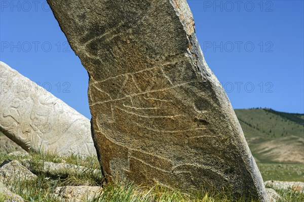 Stone stele with engravings