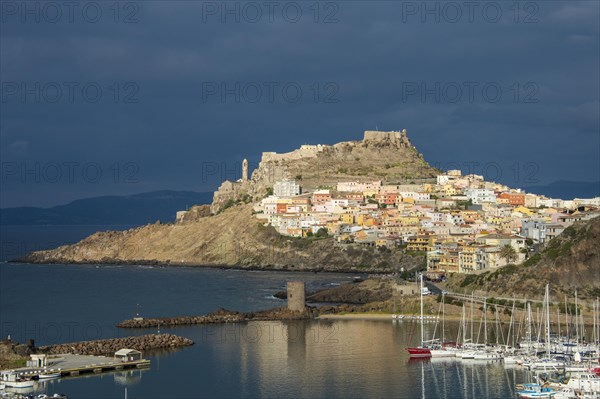 Dramatic light over the old town of Castelsardo with its boat harbour