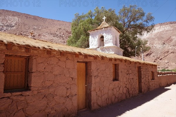 Church in the Adobese style with thatched roof