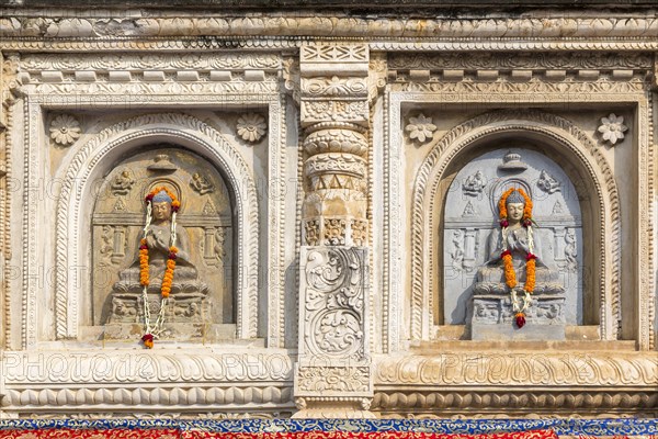 Buddha sculptures in the facade of the Mahabodhi Temple