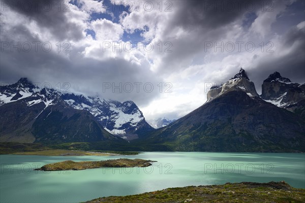 View from Mirador over Lake Pehoe to the mountains Los Cuernos with clouds